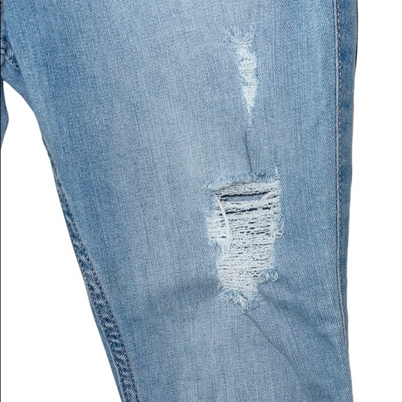 ULTRA HIGH-RISE RIPPED LIGHT WASH SUPER SKINNY JEANS. Item# 0046 - Picture 7 of 7